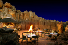 Experience dinner in an open-air boma under the Southern African sky